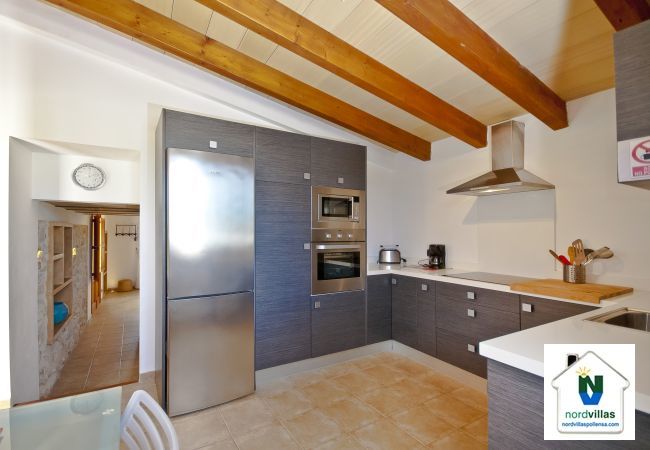 Equipped kitchen and dining table Equipped kitchen and dining table