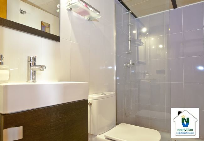 Bathroom with shower and glass partition Bathroom with shower and glass partition
