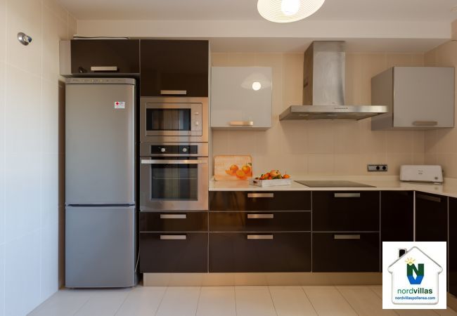 Kitchen equipped with oven, microwave, toaster, ... Kitchen equipped in Duplex La Nau B in Puerto Pollensa
