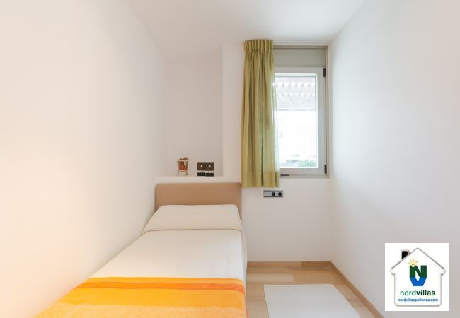 Room with a single bed on the ground floor Single bedroom on the ground floor of the apartment