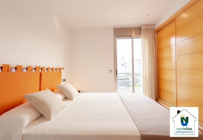 Master bedroom on the top floor of the apartment with terrace Master bedroom with double bed and built-in wardrobe