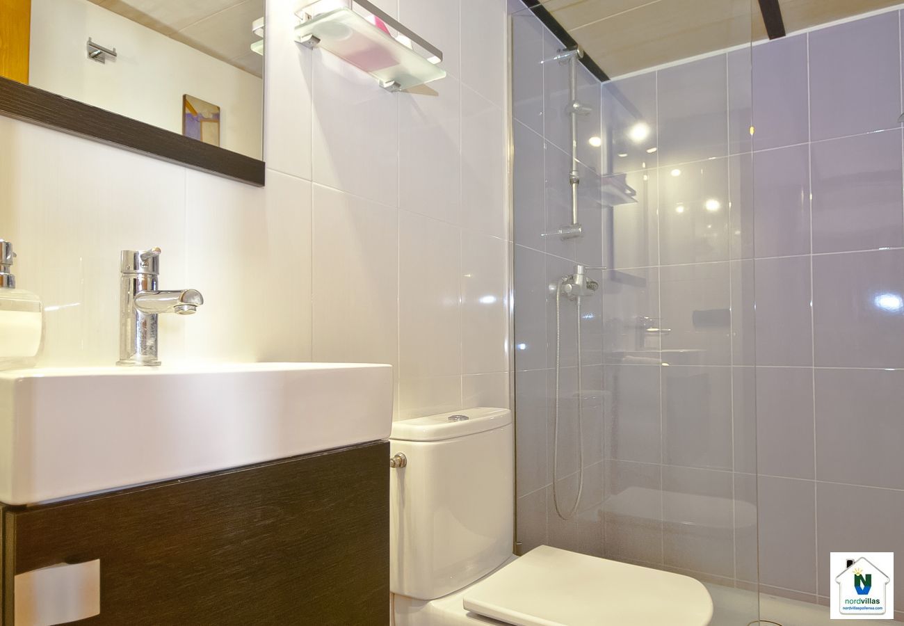 Bathroom with shower and glass partition Bathroom with shower and glass partition